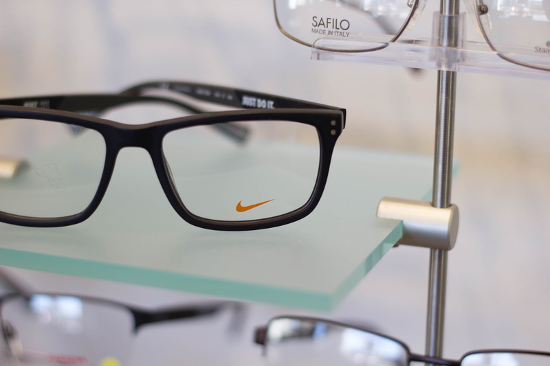 glass - material, glasses, seat, focus on foreground, table, eyewear, rear-view mirror, reflection, transportation, eyeglasses, day, eye care, eye glasses