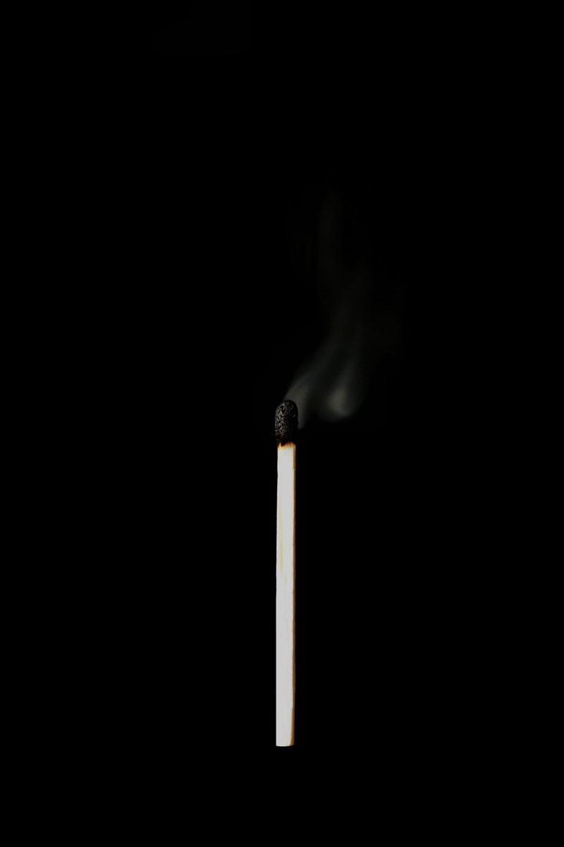 wood - material, copy space, communication, wood, indoors, single object, burnt, warning sign, black-and-white, fire - natural phenomenon, white, studio shot
