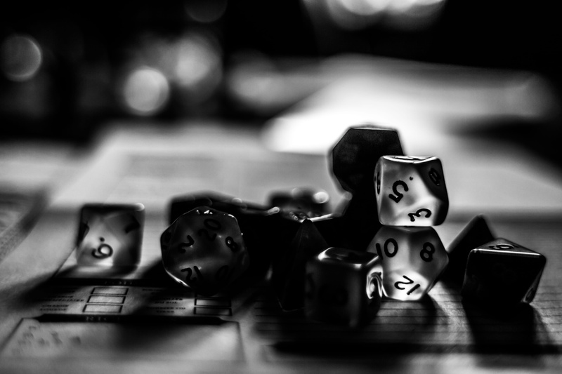 indoors, human representation, leisure activity, rpg, close-up, luck, game, toy, opportunity, gambling, selective focus, still life, game of chance, representation