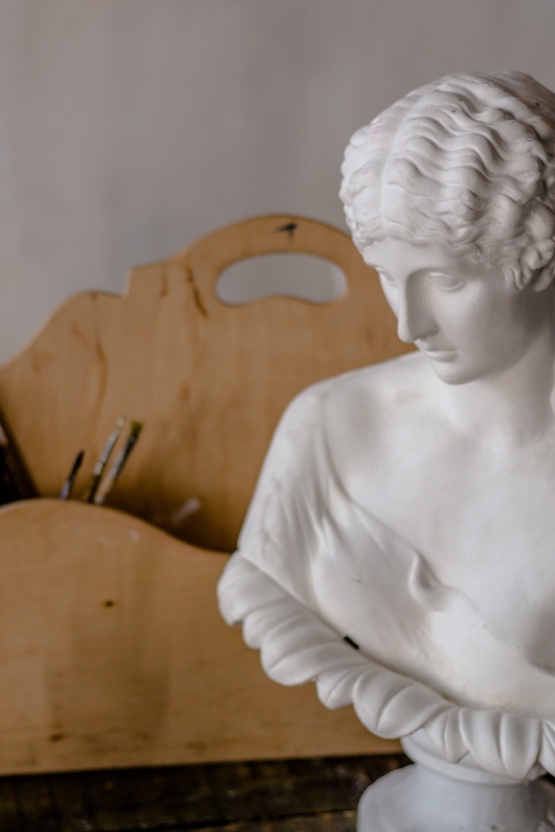 religion, indoors, occupation, art and craft, creativity, 5K, focus on foreground, figurine, female likeness, art, archaeology, plywood, no people, food