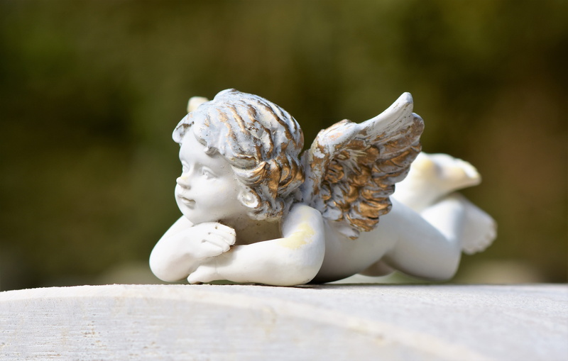 sunlight, angel figure, creativity, girl face, angel face, wing, no people, face, tombstone, representation, little angel, angel, focus on foreground, deco