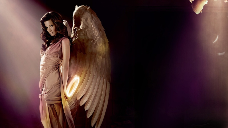 night, hairstyle, illuminated, one person, stage, wings, young adult, holding, dark, women, clothing, angel, fashion, standing, indoors, three quarter length