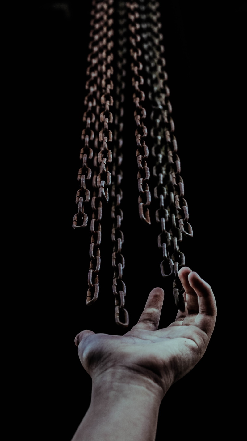 studio shot, close-up, human body part, metal, males, young adult, prison, concepts, human Hand, steel, 5K, law, criminal, adult, holding, single object