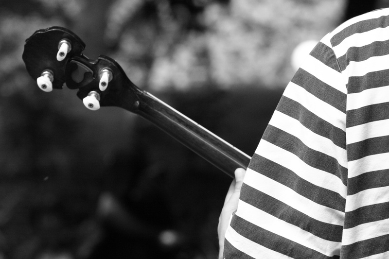 weapon, pattern, outdoors, retro styled, no people, black color, focus on foreground, nantes, guitar, sport, single object, banjo, striped, day, tree, music