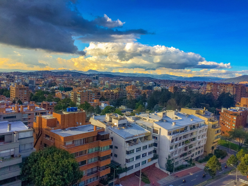 sky, day, residential district, colombia, color, outdoors, cloudscape, building, city, building exterior, cloud - sky, bogota, townscape, tree, high angle view
