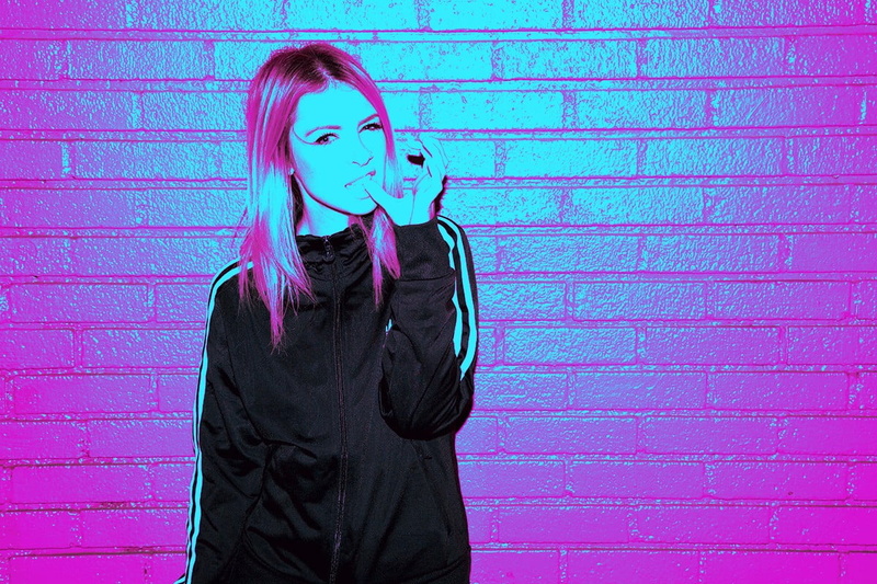 colored background, front view, looking at viewer, adult, Alison Wonderland, hairstyle, pink color, standing, 480P, portrait, clothing, dyed hair, model