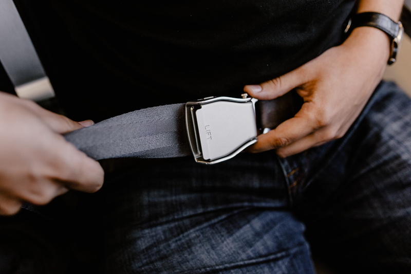 adult, flight, wireless technology, cabin, airplane, business, seat, men, travel, hand, human limb, one person, human body part, midsection, plane, transport