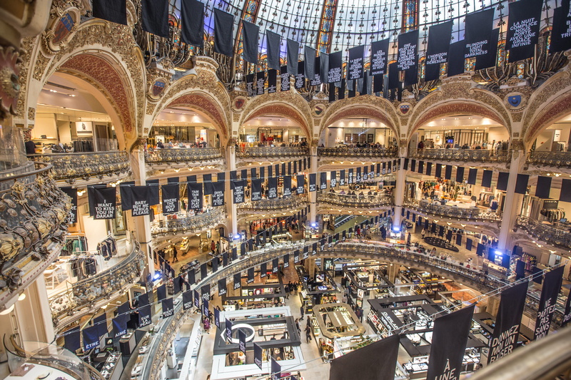 human, horizontal, galleries, fashion, architectural column, shopping mall, paris, building exterior, travel, banister, shops, illuminated, shopping, france