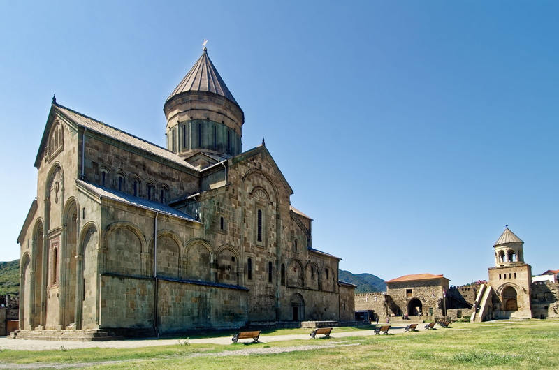 clear sky, church, day, svetitskhoveli cathedral, place of worship, grass, religion, belief, mtskheta, plant, history, nature, sky, caucasus, christianity