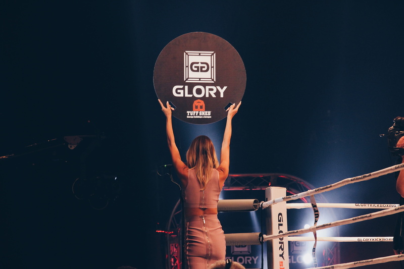 number, kickboxing, real people, female, young adult, western script, scorecard, glory, three quarter length, information sign, united states, boxing, young women