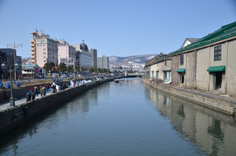 otaru, building exterior, city, sky, clear sky, architecture, travel destinations, crowd, water, residential district, river, day, built structure, reflection