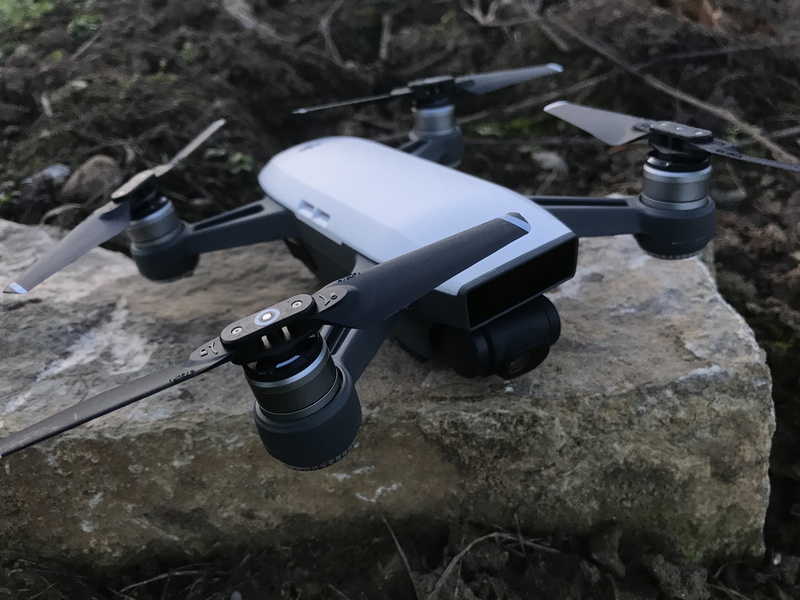 close-up, camera - photographic equipment, no people, solid, outdoors, 4K, surveillance, rock - object, security, technology, high angle view, drone, field
