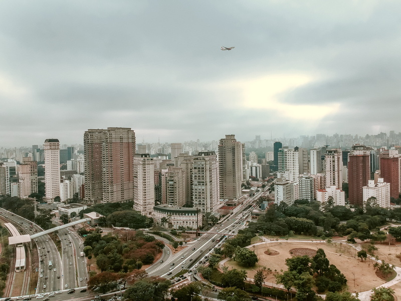 no people, office building exterior, tree, mode of transportation, high angle view, road, built structure, transportation, street, nature, dji, tall - high