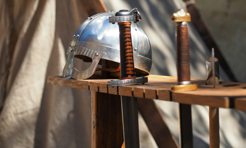 focus on foreground, drink, lantern, helmet, sword, no people, wood - material, beside, knight, electric lamp, still life, nature, photography, history