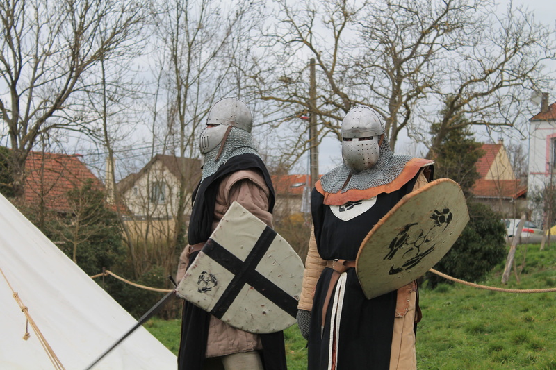 people, chivalry, real people, combat, middle ages, coat of arms, nature, standing, lifestyles, two people, mesh side, holding, knight, trees, clothing