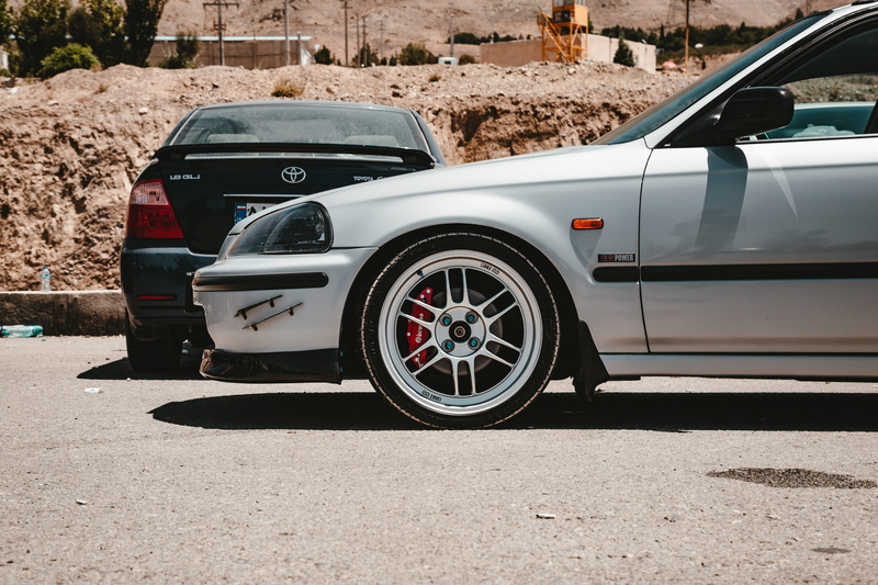 sunlight, civic, day, motor vehicle, sport cars, shadow, rings, mode of transportation, travel, city, ring, parking, jdm, sport car, enkei, brembo, background
