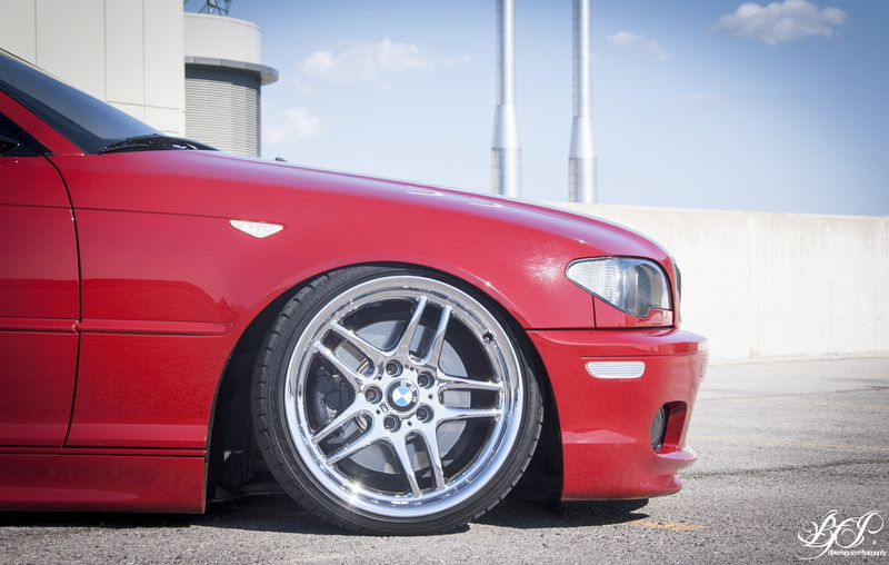 land vehicle, sports car, cloud - sky, outdoors, red, car, wheel, silver colored, city, no people, luxury, road, BMW, sky, day, mode of transportation