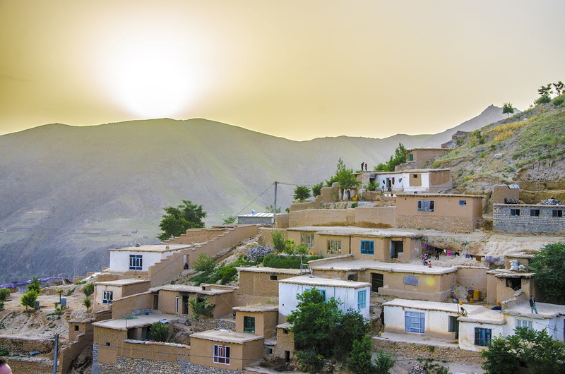 building exterior, nature, stone house, green, architecture, town, house, no people, sky, day, Afghanistan, beauty in nature, plant, mountain, white, built structure