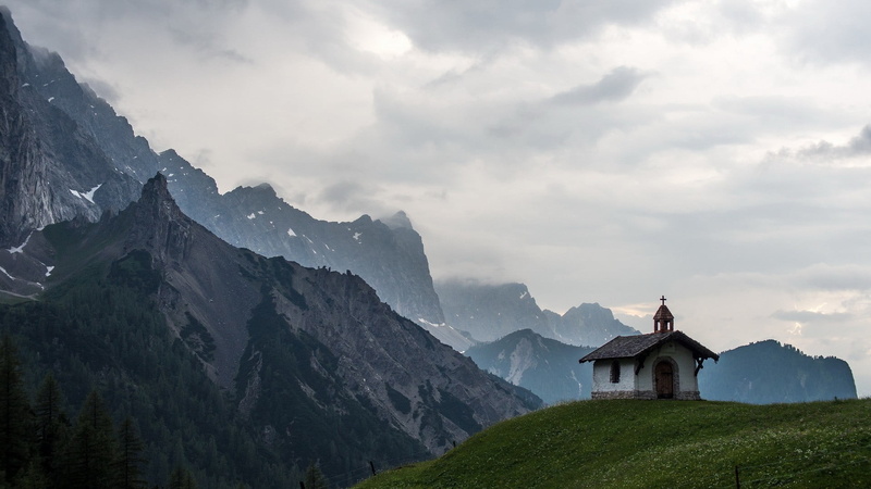 architecture, mountain peak, brown, outdoors, house, hills, trees, nature, mountains, landscape, environment, belief, white, no people, spirituality, built structure