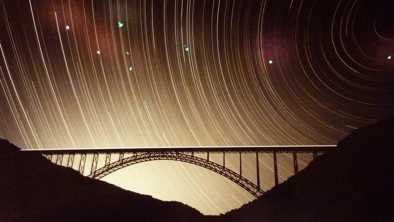 built structure, low angle view, bridge - man made structure, bridge, silhouette, astronomy, nature, beauty in nature, star trails, scenics - nature, night