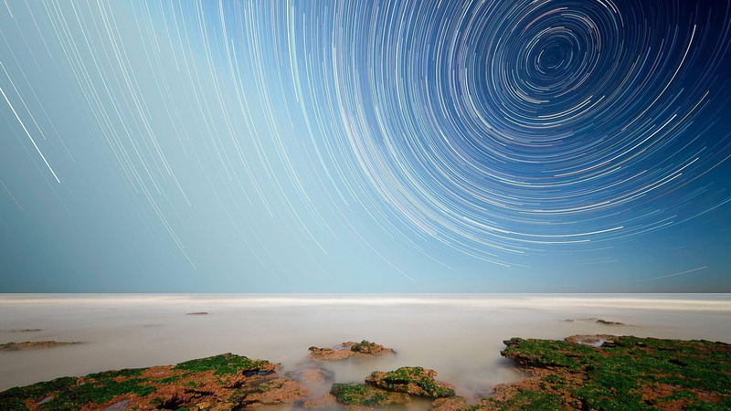 night, blurred motion, star - space, scenics - nature, astrophotography, star trail, water, beauty in nature, capture, motion, star trails, turning, concentric