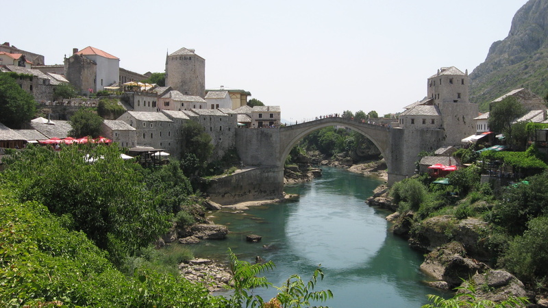 tree, travel destinations, concrete, flowing water, arch bridge, water, old town, across, sky, ottoman bridge, gray, bridge, nature, view of the city, arch