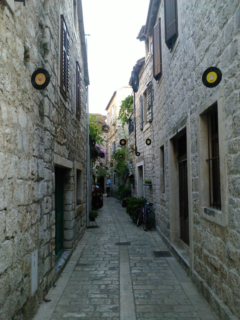 building exterior, vacations, old, footpath, outdoors, wall, narrow, day, city, patch, stari grad, the way forward, hvar, direction, stone wall, alley