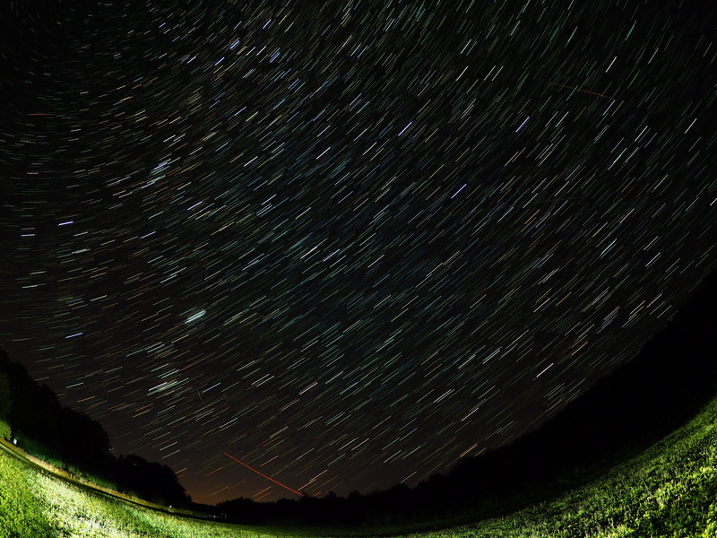low angle view, tranquil scene, space, nature, majestic, beauty in nature, rotation of the earth, star trail, star, night sky, no people, scenics - nature