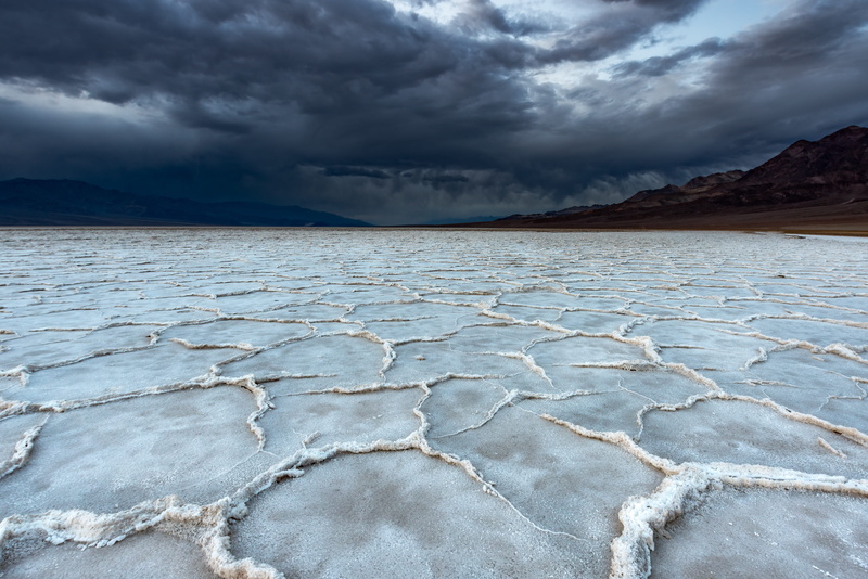 dramatic sky, tranquil scene, national park, distance, acrid, tranquility, mineral, beauty in nature, overcast, death valley, sky, terrain, storm, lagoon