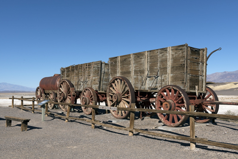 abandoned, blue, copy space, no people, mining, sunlight, old, rusty, fence, brown, nature, historic, desert, industry, trailers, team, wheel, works, train