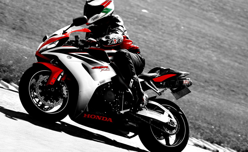 headwear, motorcycle, high angle view, sports race, outdoors, land vehicle, motorsport, crash helmet, transportation, riding, one person, sports helmet