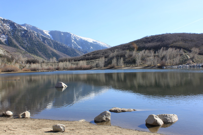 rock - object, lake, sun, cold temperature, rocks, reflection, water, sunshine, mountain, landscape, snowcapped mountain, beauty in nature, tree, scenics - nature