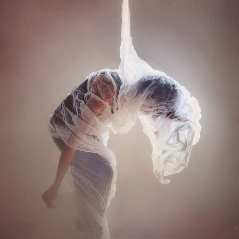 human arm, arms raised, lightpainting, net, abstract, studio, digital composite, art, woman, 2K, copyspace, short hair, women, wrapped, dress, dancing