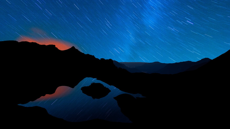 long exposure, space, silhouette, astronomy, beauty in nature, space and astronomy, idyllic, mountains, star - space, sky, sunset, tranquil scene, no people