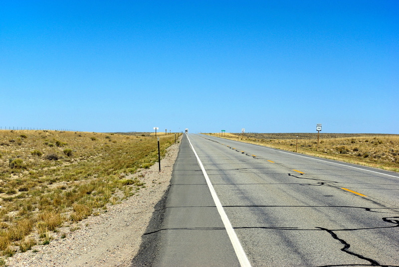 arid, 2K, the way forward, scenery, plains, diminishing perspective, sign, no people, day, high, transportation, dividing line, nature, symbol, vanishing point