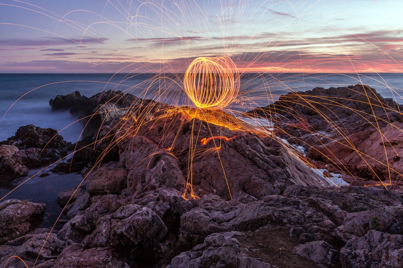 horizon over water, outdoors, scenics - nature, illuminated, wooden, beauty in nature, water, solid, sunset, fireworks, nature, wire wool, white, long exposure