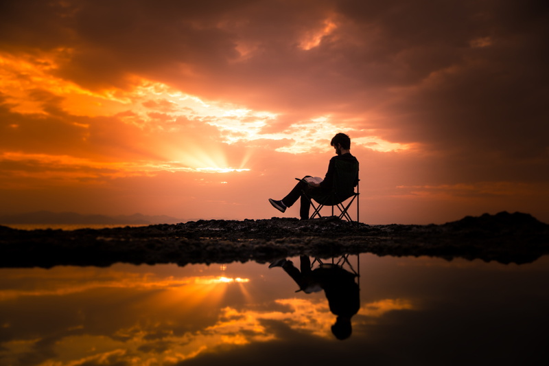 clouds, environment, orange color, sun, real people, summer, sunrise, scenery, nature, reader, reading, leisure, person, sitting, one person, water, idyllic