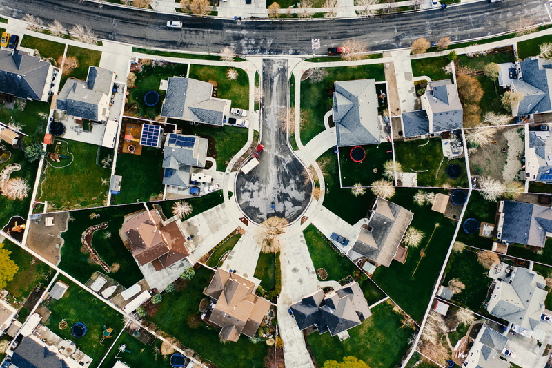 scenic, birds eye view, outdoors, day, scenery, drone footage, modern, roofs, design, vehicles, 5K, village, bright, view, buildings, aerial shot, digital composite
