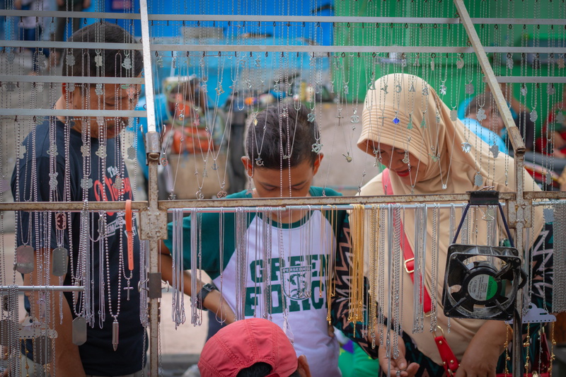 glass - material, clothing, necklace, leisure activity, lifestyles, real people, street, transparent, street photography, indonesia, people, child, adult