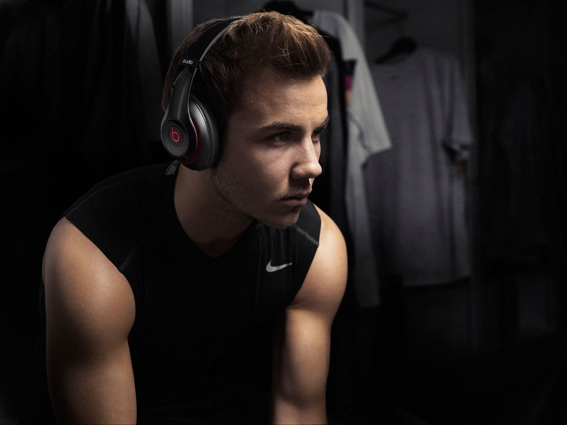 top, young men, music, dark, focus on foreground, Germany, looking, indoors, side view, portrait, headphones, tank, black, Beats, hairstyle, soccer, headshot