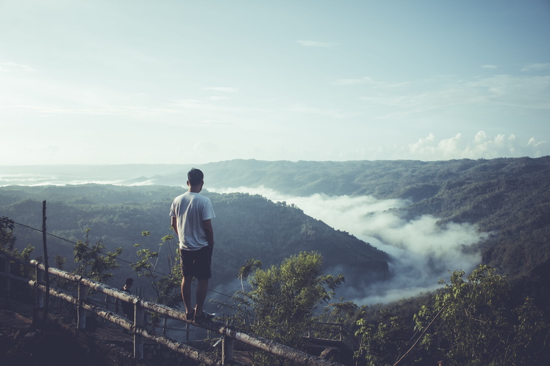 looking at view, sky, casual clothing, landscape, indonesia, outdoors, cloud - sky, rear view, mountain, mountain range, tranquility, real people, scenics - nature