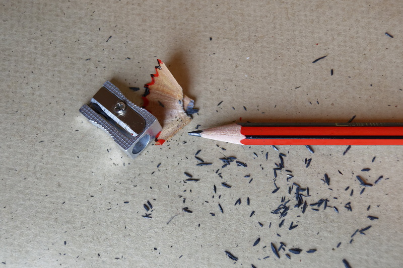 high angle view, land, rubber, indoors, paper, education, still life, sunlight, people, day, writing instrument, eraser, wood, office, creativity, pencil