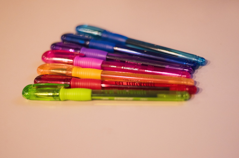 light blue, aqua, bokeh, pencil, table, writing, colorful, indoors, grafitti, graffiti, pen, creativity, no people, idea, write, writing instrument, education