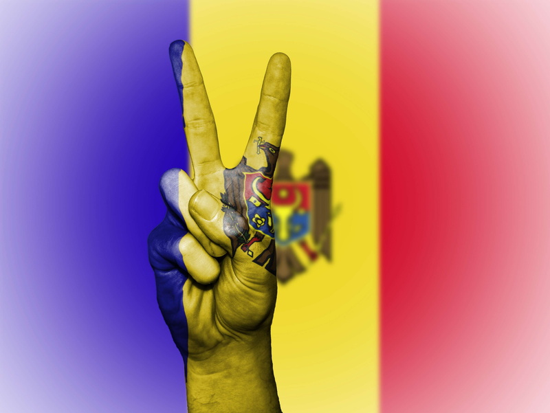 copy space, adult, close-up, hand, country, finger, royalty, icon, one person, colored background, tourism, state, graphic, peace, ensign, national, blue
