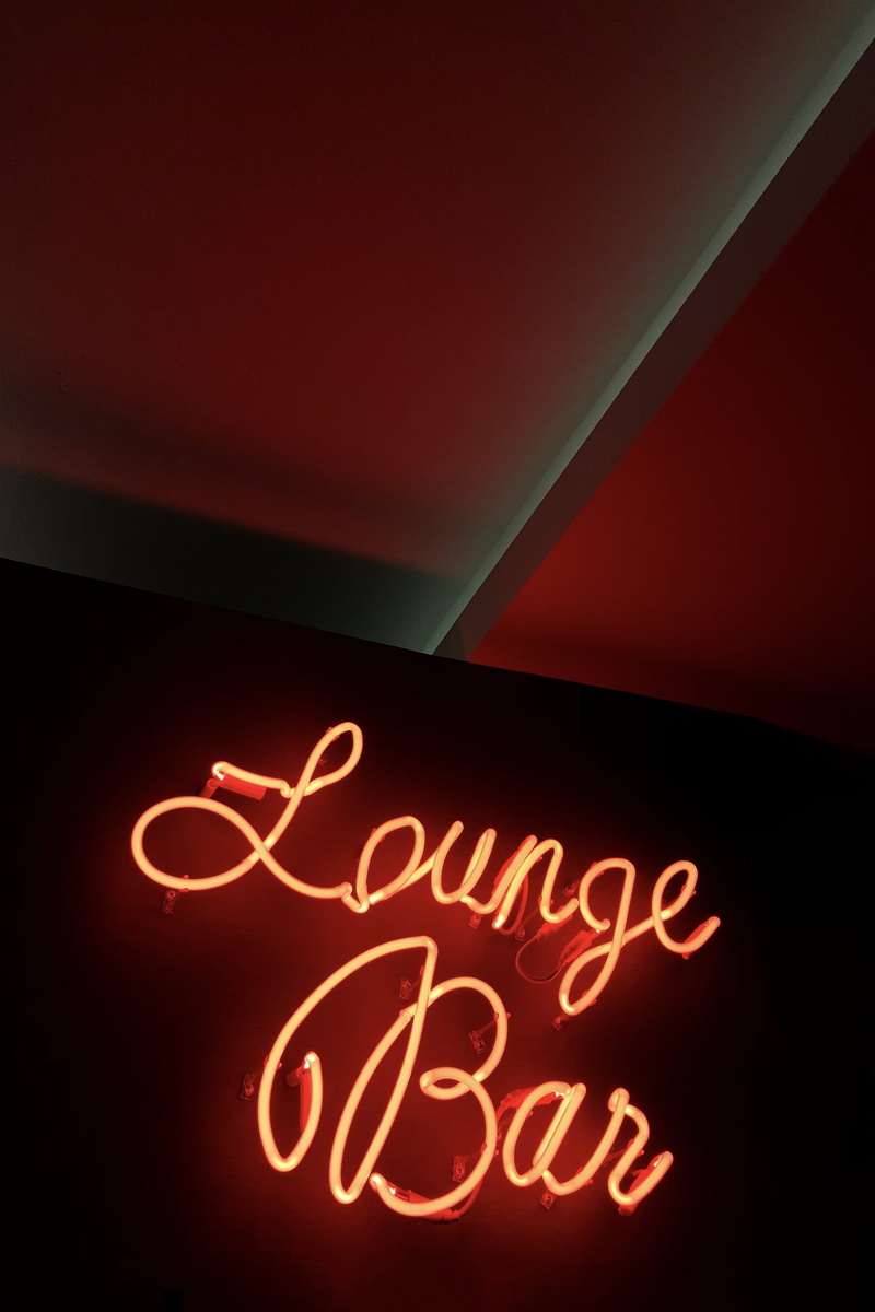 advertisement, love, black background, emotion, handwriting, nightlife, light - natural phenomenon, lounge, symbol, lighting equipment, poster, lighted