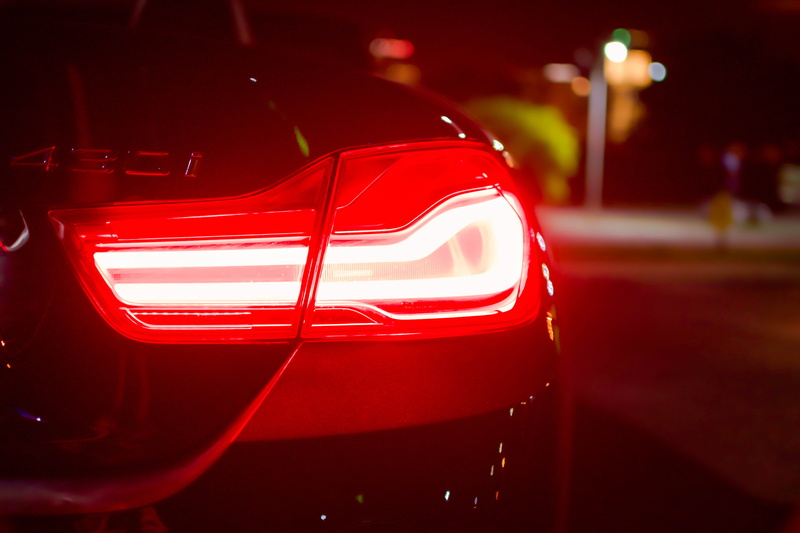 glass - material, mode of transportation, new, light, no People, road, car, street, vehicle light, headlight, elegance, taillight, shiny, speed, modern