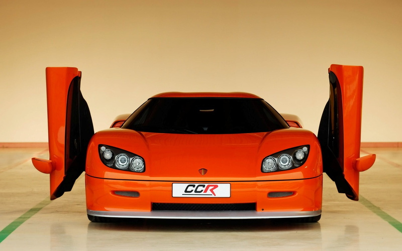1080P, transportation, no people, car, toy car, orange color, land vehicle, focus on foreground, die, clear sky, Headlights, text, Koenigsegg, sunset