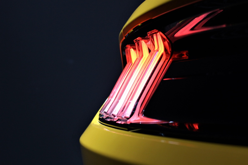 indoors, lighting equipment, yellow, wheel, mode of transportation, technology, excitement, modern technology, single object, copy space, power, sport