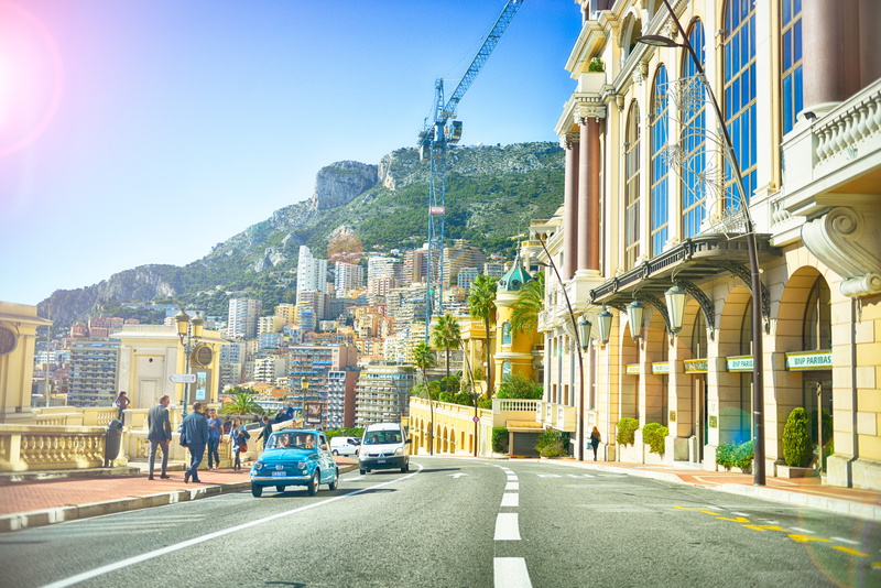 sky, hotels, building, sunlight, building exterior, village, vacation, boardwalk, transportation, crane, architecture, outdoors, street, incidental people