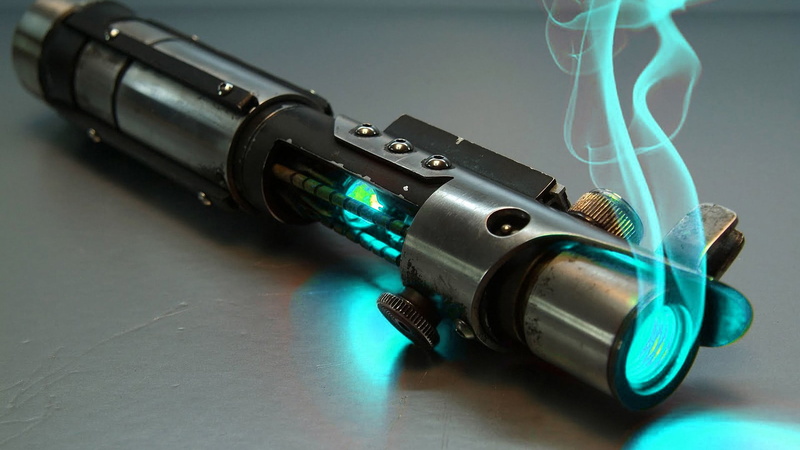 security, weapon, two objects, communication, government, warning sign, tool, teal, gray, Star Wars, science, sign, lightsaber, handheld, close-up, indoors